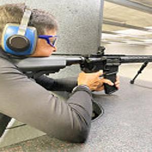 indoor shooting range training with ear and eye protection in a controlled environment